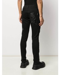 schwarze Jeans mit Destroyed-Effekten von Philipp Plein