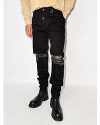 schwarze Jeans mit Destroyed-Effekten von Represent