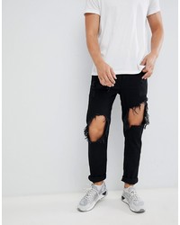 schwarze Jeans mit Destroyed-Effekten von Diesel