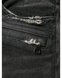 schwarze Jeans mit Destroyed-Effekten von Balmain