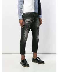 schwarze Jeans mit Destroyed-Effekten von Overcome