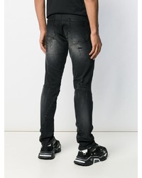 schwarze Jeans mit Destroyed-Effekten von Faith Connexion