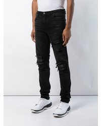 schwarze Jeans mit Destroyed-Effekten von Amiri