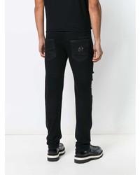 schwarze Jeans mit Destroyed-Effekten von Philipp Plein