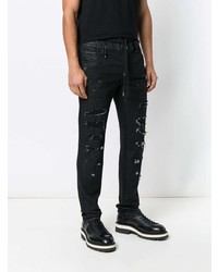 schwarze Jeans mit Destroyed-Effekten von Philipp Plein