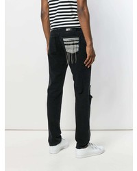 schwarze Jeans mit Destroyed-Effekten von MSGM