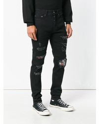 schwarze Jeans mit Destroyed-Effekten von Overcome