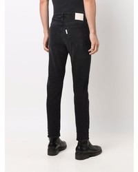 schwarze Jeans mit Destroyed-Effekten von Haikure