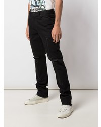 schwarze Jeans mit Destroyed-Effekten von Haculla