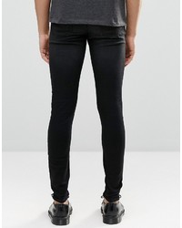 schwarze Jeans mit Destroyed-Effekten von Cheap Monday