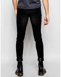 schwarze Jeans mit Destroyed-Effekten von Cheap Monday