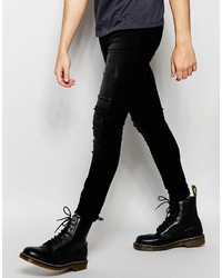 schwarze Jeans mit Destroyed-Effekten von Cheap Monday