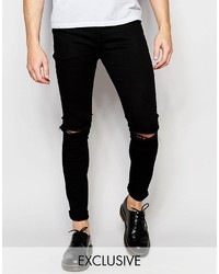 schwarze Jeans mit Destroyed-Effekten