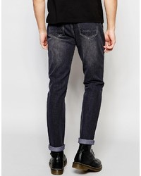 schwarze Jeans mit Destroyed-Effekten