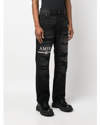 schwarze Jeans mit Destroyed-Effekten von Amiri