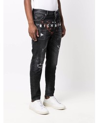 schwarze Jeans mit Destroyed-Effekten von John Richmond