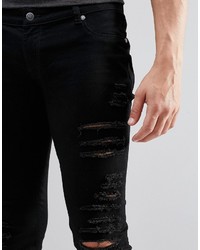 schwarze Jeans mit Destroyed-Effekten von Cheap Monday