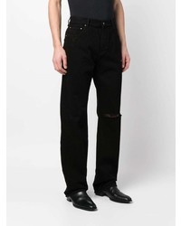 schwarze Jeans mit Destroyed-Effekten von Amiri