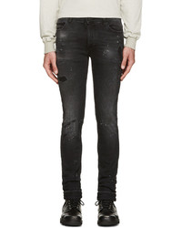 schwarze Jeans mit Destroyed-Effekten von Marcelo Burlon County of Milan