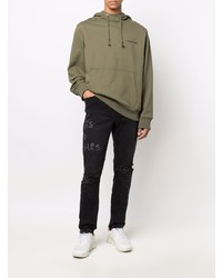 schwarze Jeans mit Destroyed-Effekten von Ksubi