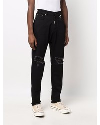 schwarze Jeans mit Destroyed-Effekten von Represent