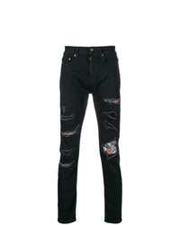 schwarze Jeans mit Destroyed-Effekten von Overcome
