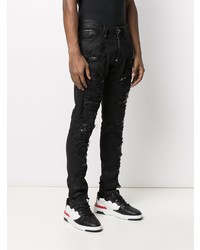 schwarze Jeans mit Destroyed-Effekten von Philipp Plein