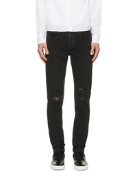 schwarze Jeans mit Destroyed-Effekten von rag & bone