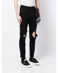 schwarze Jeans mit Destroyed-Effekten von Musium Div.