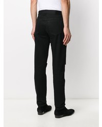 schwarze Jeans mit Destroyed-Effekten von Balmain