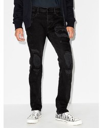 schwarze Jeans mit Destroyed-Effekten von True Religion