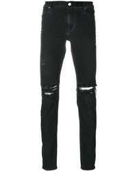 schwarze Jeans mit Destroyed-Effekten von RtA