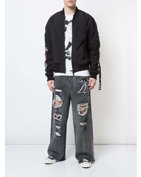 schwarze Jeans mit Destroyed-Effekten von Haculla
