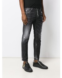 schwarze Jeans mit Destroyed-Effekten von DSQUARED2