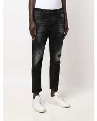 schwarze Jeans mit Destroyed-Effekten von Dondup