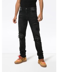 schwarze Jeans mit Destroyed-Effekten von Amiri