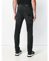 schwarze Jeans mit Destroyed-Effekten von Philipp Plein