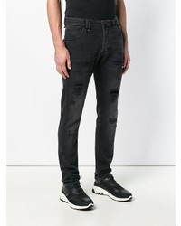 schwarze Jeans mit Destroyed-Effekten von Philipp Plein