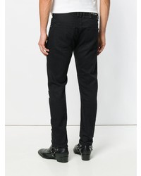 schwarze Jeans mit Destroyed-Effekten von Balmain