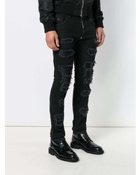 schwarze Jeans mit Destroyed-Effekten von Philipp Plein