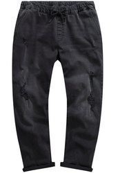 schwarze Jeans mit Destroyed-Effekten von STHUGE