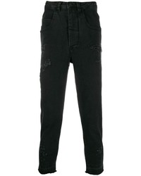 schwarze Jeans mit Destroyed-Effekten von Thom Krom