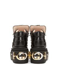 schwarze klobige flache Stiefel mit einer Schnürung aus Leder von Gucci