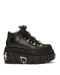 schwarze klobige flache Stiefel mit einer Schnürung aus Leder von Gucci