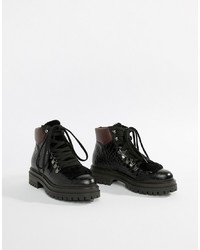 schwarze klobige flache Stiefel mit einer Schnürung aus Leder von Kurt Geiger London