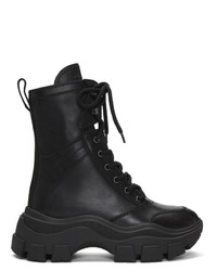 schwarze klobige flache Stiefel mit einer Schnürung aus Leder von Prada