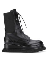 schwarze klobige flache Stiefel mit einer Schnürung aus Leder von Premiata