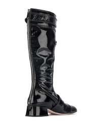 schwarze kniehohe Stiefel aus Leder von Miu Miu