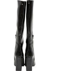 schwarze kniehohe Stiefel aus Leder von Buffalo
