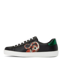 schwarze Leder niedrige Sneakers mit Schlangenmuster von Gucci
